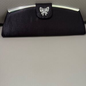 Elegant Black and Silver Clutch with Butterfly Clasp